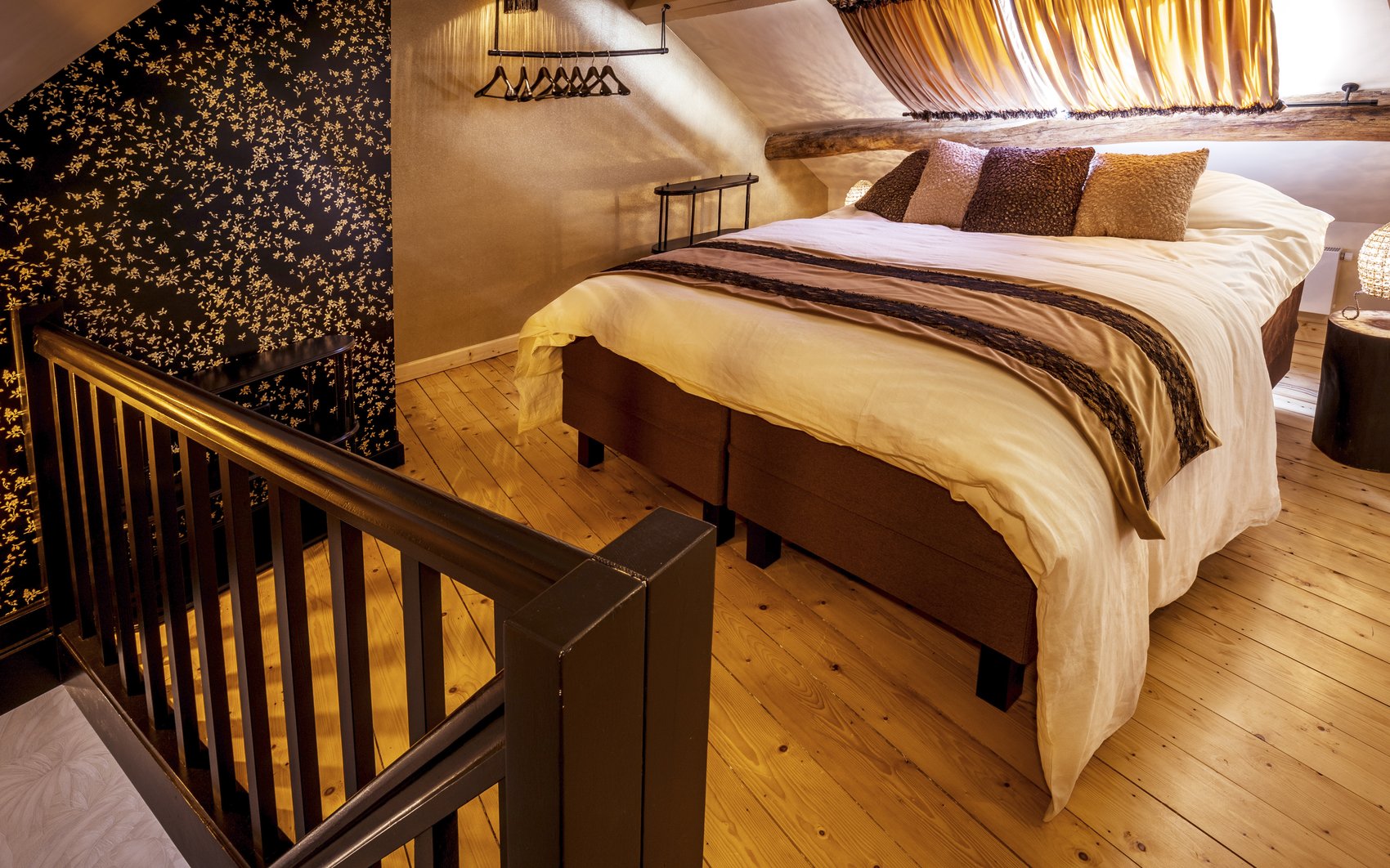 Attic bedroom and the mezzanine stair